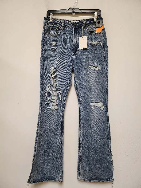 Men's Jeans with a Destroyed LookJeans Flared By Clothes Mentor In Blue Denim, Size: 6